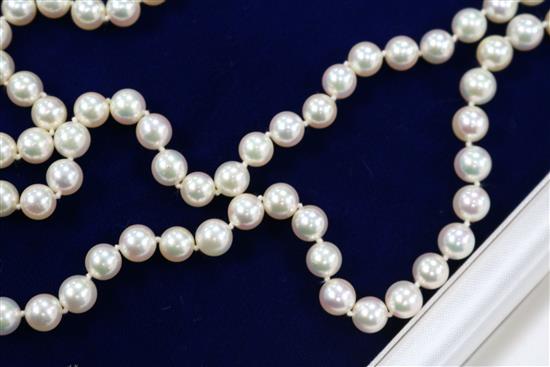*A Mikimoto single strand cultured pearl necklace with 18ct gold clasp, with Mikimoto box, 36in.
